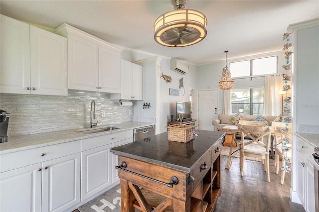 76 Heather Point Ct, New Smyrna Beach, FL 32169 - kitchen with a sink, an AC wall unit, stainless steel dishwasher, a ceiling fan, and decorative backsplash