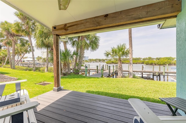 76 Heather Point Ct, New Smyrna Beach, FL 32169 - wooden deck with a water view, a dock, and a yard