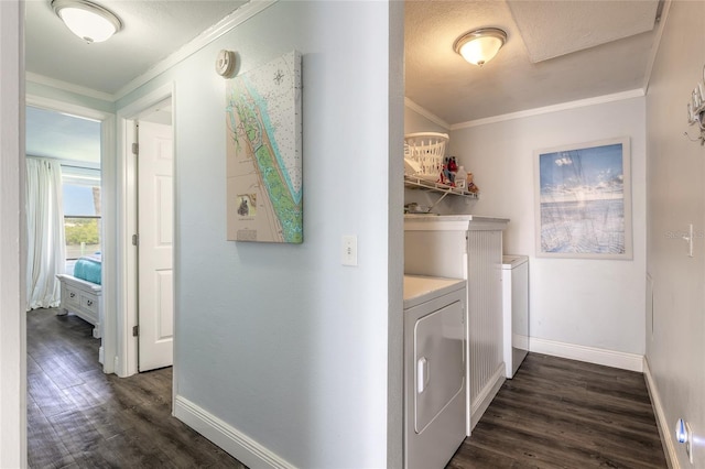 76 Heather Point Ct, New Smyrna Beach, FL 32169 - washroom with washing machine and dryer, dark wood finished floors, baseboards, and crown molding