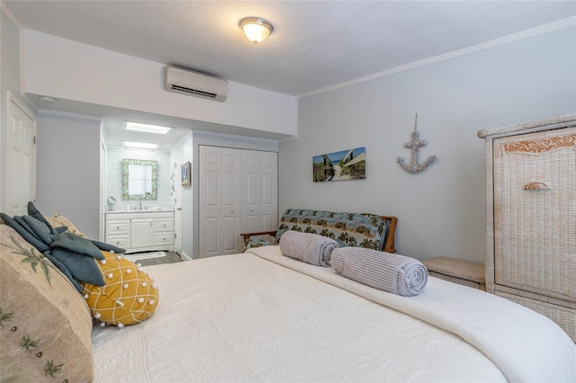 76 Heather Point Ct, New Smyrna Beach, FL 32169 - bedroom with a wall unit AC, a closet, a sink, ensuite bathroom, and ornamental molding