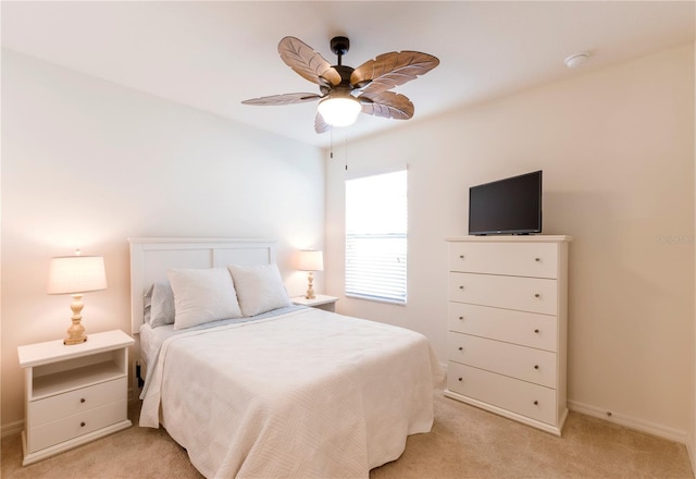 2818 Taton Trce, New Smyrna Beach, FL 32168 - bedroom with light carpet, baseboards, and ceiling fan