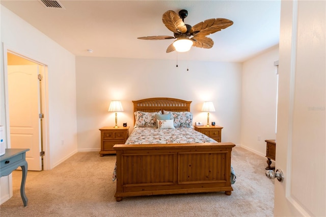 2818 Taton Trce, New Smyrna Beach, FL 32168 - bedroom featuring light carpet, baseboards, and a ceiling fan