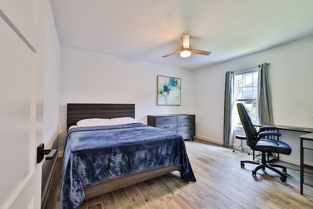 475 Spruceview Dr, Port Orange, FL 32127 - bedroom with light wood finished floors, baseboards, a desk, and ceiling fan