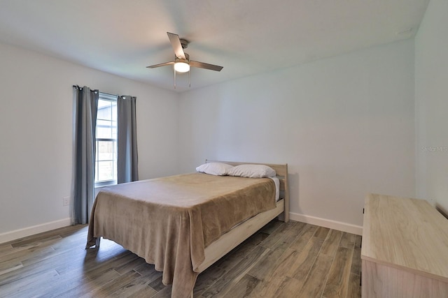 475 Spruceview Dr, Port Orange, FL 32127 - bedroom featuring wood finished floors, baseboards, and a ceiling fan
