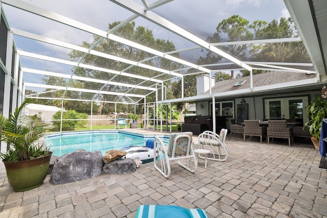 475 Spruceview Dr, Port Orange, FL 32127 - outdoor pool with a jacuzzi, a patio, glass enclosure, and french doors