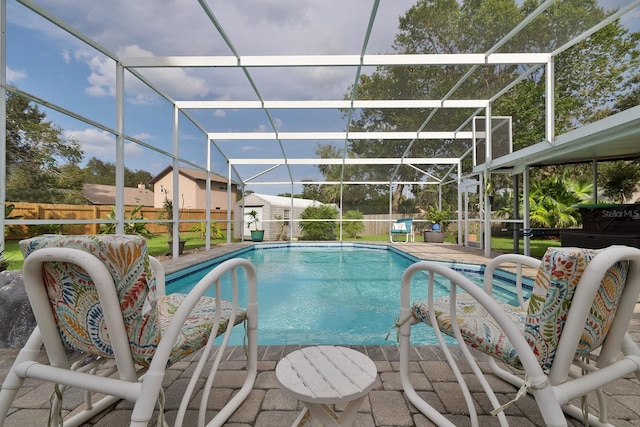475 Spruceview Dr, Port Orange, FL 32127 - view of swimming pool with a fenced backyard, glass enclosure, and a patio area