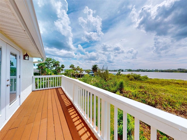 2950 Sunset Dr, New Smyrna Beach, FL 32168 - wooden terrace with a water view