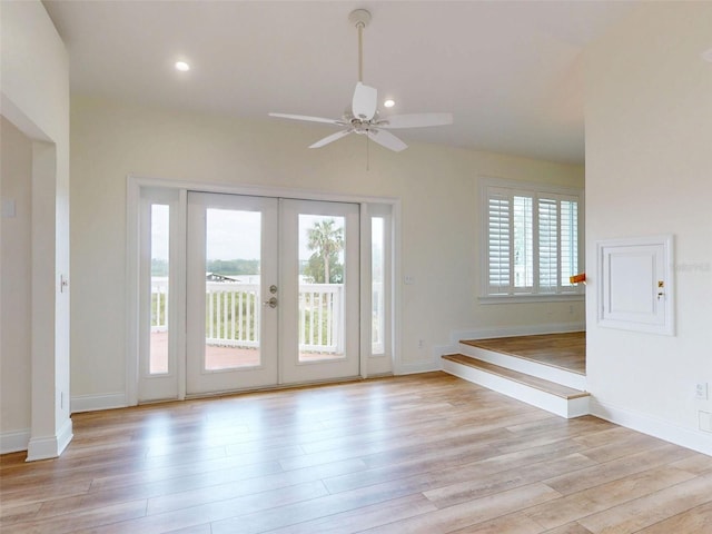 2950 Sunset Dr, New Smyrna Beach, FL 32168 - entryway with light wood-type flooring, ceiling fan, french doors, recessed lighting, and baseboards
