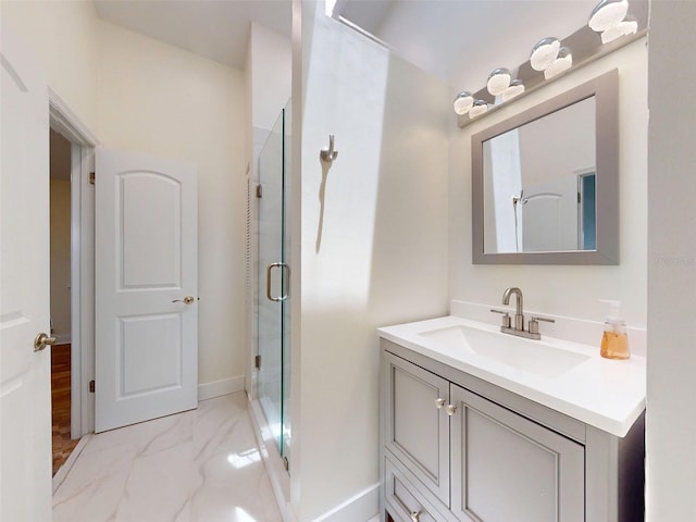 2950 Sunset Dr, New Smyrna Beach, FL 32168 - full bathroom featuring marble look tile flooring, a shower stall, vanity, and baseboards