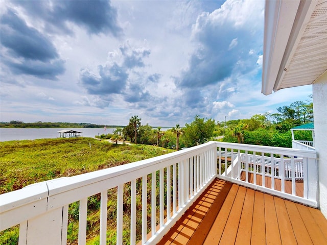 2950 Sunset Dr, New Smyrna Beach, FL 32168 - wooden deck featuring a water view