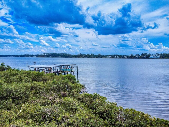 2950 Sunset Dr, New Smyrna Beach, FL 32168 - dock featuring a water view