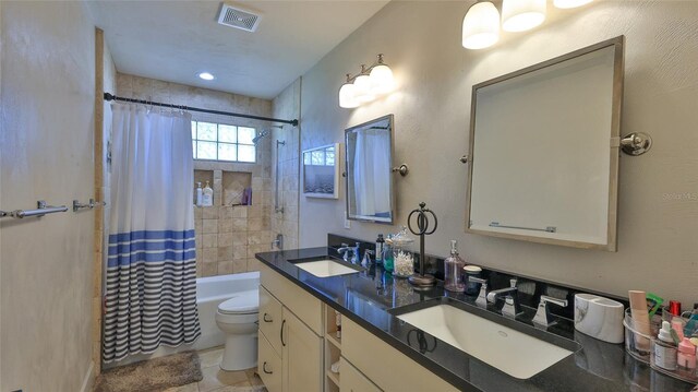 798 Fairway Dr, New Smyrna Beach, FL 32168 - bathroom with toilet, shower / tub combo, and double vanity