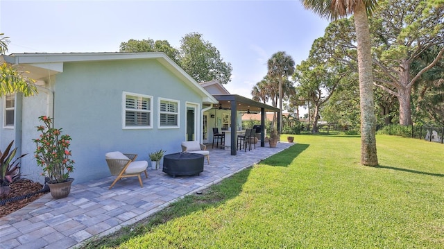 798 Fairway Dr, New Smyrna Beach, FL 32168 - view of yard featuring a ceiling fan and a patio