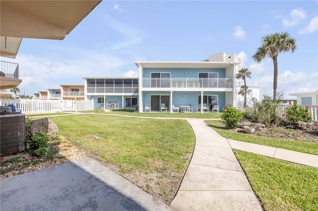 525 N Atlantic Ave Unit 39, New Smyrna Beach, FL 32169 - rear view of property featuring a balcony and stucco siding