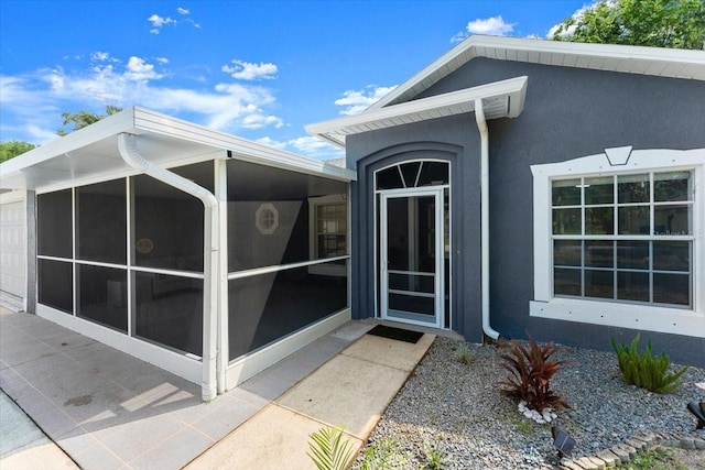 2325 Lime Tree Dr, Edgewater, FL 32141 - doorway to property featuring stucco siding