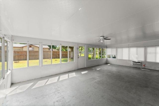 2325 Lime Tree Dr, Edgewater, FL 32141 - unfurnished sunroom featuring a ceiling fan and an AC wall unit