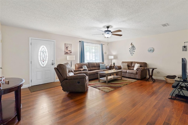 1723 Needle Palm Dr, Edgewater, FL 32132 - living room with ceiling fan, wood finished floors, and a textured ceiling