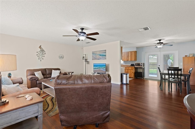 1723 Needle Palm Dr, Edgewater, FL 32132 - living room with ceiling fan, dark wood-style floors, and a textured ceiling