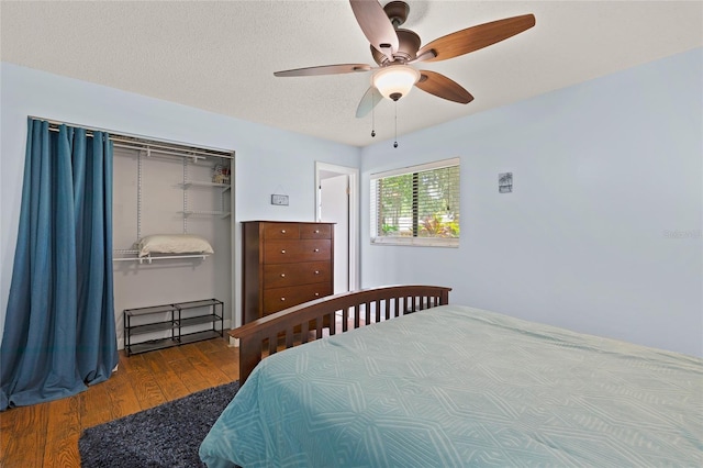 1723 Needle Palm Dr, Edgewater, FL 32132 - bedroom with wood finished floors, a closet, and a ceiling fan