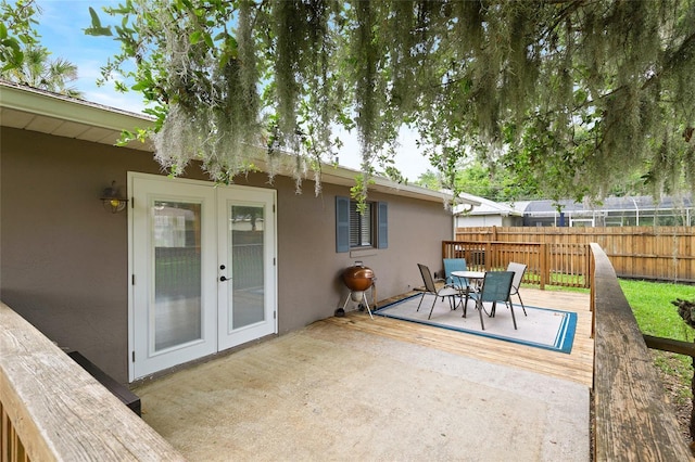 1723 Needle Palm Dr, Edgewater, FL 32132 - view of patio / terrace featuring outdoor dining area, french doors, and a deck