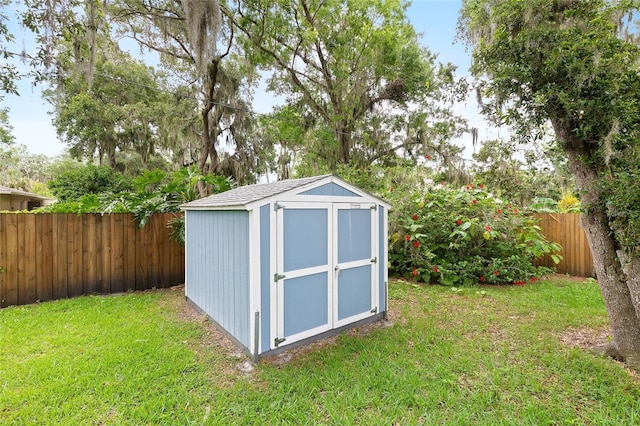 1723 Needle Palm Dr, Edgewater, FL 32132 - view of shed with a fenced backyard