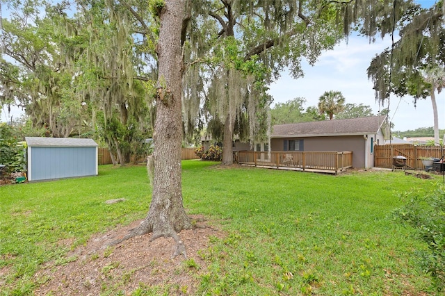 1723 Needle Palm Dr, Edgewater, FL 32132 - fenced backyard with a shed and a deck