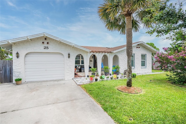 25 Dolphin Ave, Ormond Beach, FL 32176 - view of front facade with an attached garage, concrete driveway, a porch, and stucco siding