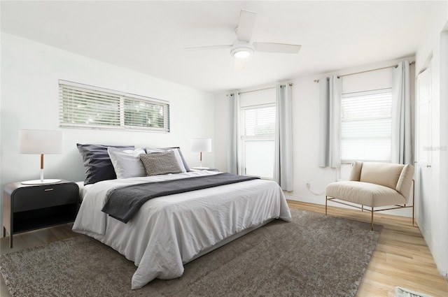 25 Dolphin Ave, Ormond Beach, FL 32176 - bedroom with light wood finished floors and a ceiling fan