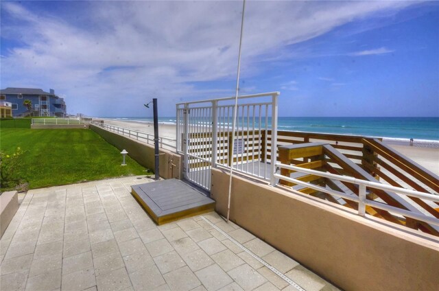 4435 S Atlantic Ave Unit 416, Port Orange, FL 32127 - view of patio / terrace with view of water and beach