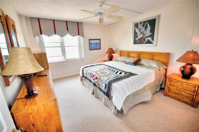 4435 S Atlantic Ave Unit 416, Port Orange, FL 32127 - bedroom featuring light carpet, ceiling fan, and baseboards
