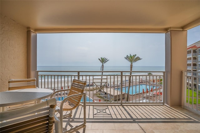 5501 S Atlantic Ave Unit 4090, New Smyrna Beach, FL 32169 - balcony with a water view and view of pool area
