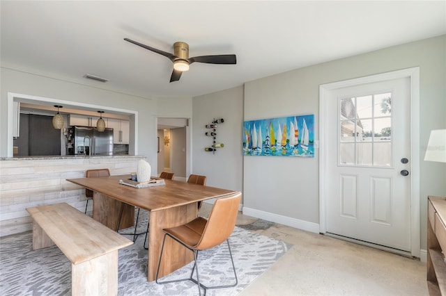 2900 S Peninsula Dr, Daytona Beach, FL 32118 - dining room with a ceiling fan and baseboards