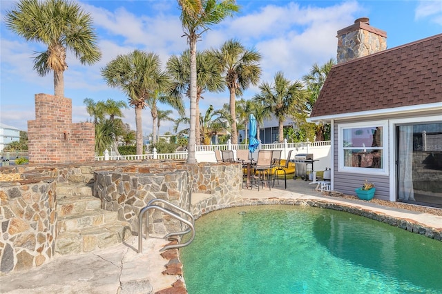 2900 S Peninsula Dr, Daytona Beach, FL 32118 - view of pool with a patio and a grill