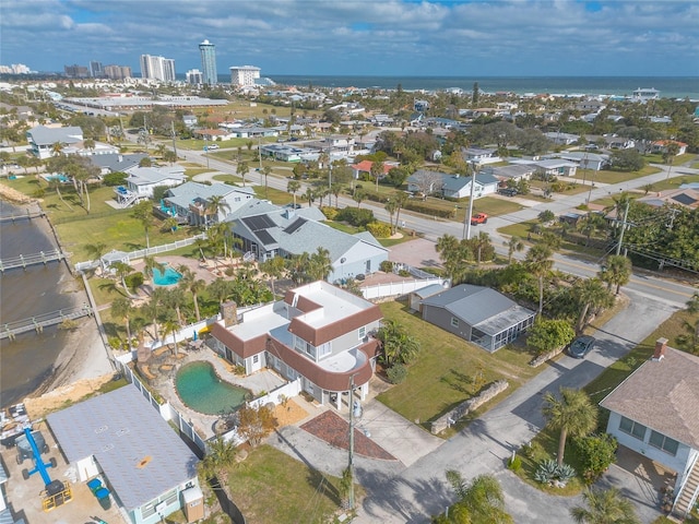 2900 S Peninsula Dr, Daytona Beach, FL 32118 - aerial overview of property's location with a pool area and nearby suburban area