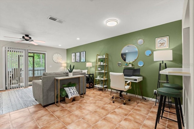 140 Limewood Pl Unit C, Ormond Beach, FL 32174 - living room featuring ceiling fan and light tile patterned floors