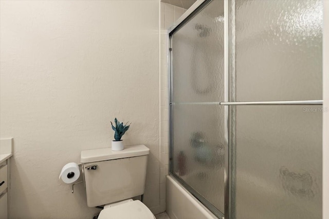 140 Limewood Pl Unit C, Ormond Beach, FL 32174 - bathroom with vanity, toilet, and shower / bath combination with glass door