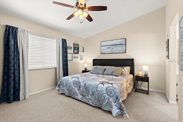 140 Limewood Pl Unit C, Ormond Beach, FL 32174 - carpeted bedroom featuring baseboards, lofted ceiling, and a ceiling fan
