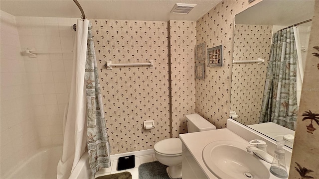 2700 N Peninsula Ave Unit 322, New Smyrna Beach, FL 32169 - bathroom with toilet, shower / bath combo, vanity, and tile patterned floors