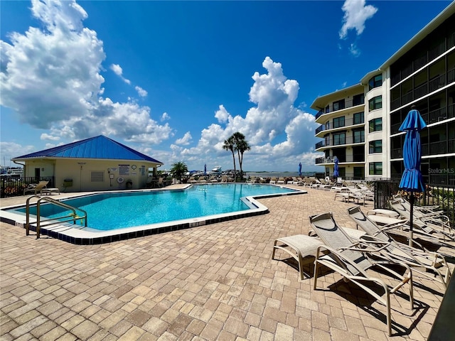 2700 N Peninsula Ave Unit 322, New Smyrna Beach, FL 32169 - community pool featuring a patio