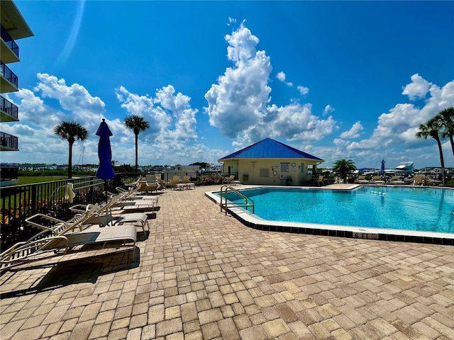 2700 N Peninsula Ave Unit 322, New Smyrna Beach, FL 32169 - community pool featuring a patio