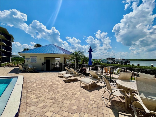 2700 N Peninsula Ave Unit 322, New Smyrna Beach, FL 32169 - view of patio / terrace featuring a water view