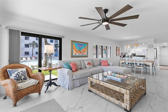 5301 S Atlantic Ave Unit 140, New Smyrna Beach, FL 32169 - living area with marble finish flooring, ornamental molding, a chandelier, and a ceiling fan