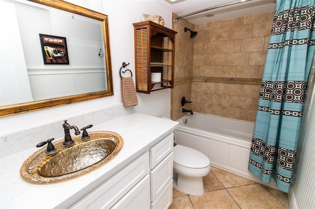 5301 S Atlantic Ave Unit 140, New Smyrna Beach, FL 32169 - bathroom with vanity, shower / bathtub combination with curtain, toilet, and tile patterned flooring