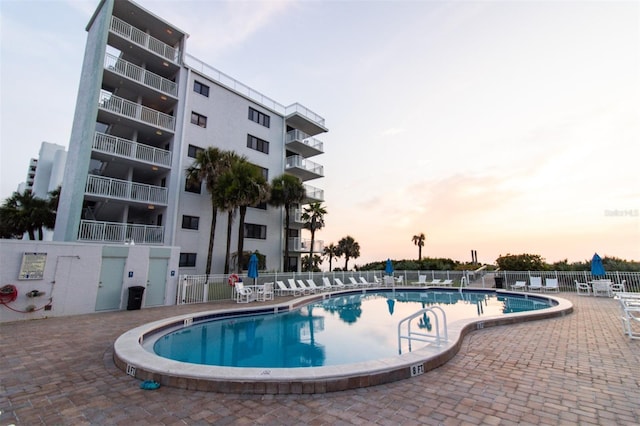 5301 S Atlantic Ave Unit 140, New Smyrna Beach, FL 32169 - community pool featuring a patio