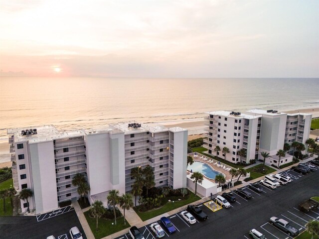 5301 S Atlantic Ave Unit 140, New Smyrna Beach, FL 32169 - aerial view of a nearby body of water, a pool, and apartment complex / building