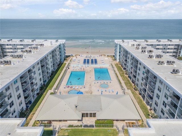 4151 S Atlantic Ave Unit 3090, New Smyrna Beach, FL 32169 - drone / aerial view of a pool, a large body of water, and apartment complex / building