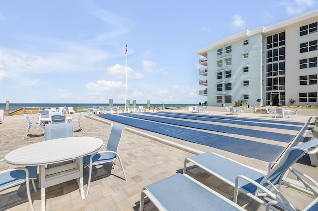 4151 S Atlantic Ave Unit 3090, New Smyrna Beach, FL 32169 - view of pool featuring shuffleboard and a water view