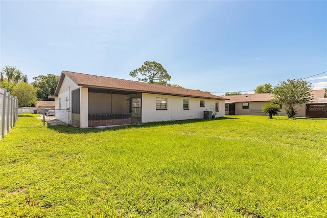 3044 Pine Tree Dr, Edgewater, FL 32141 - rear view of property with cooling unit, stucco siding, and a gate