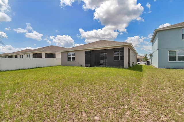 7223 SW 61st Pl, Ocala, FL 34474 - rear view of property featuring a sunroom and stucco siding