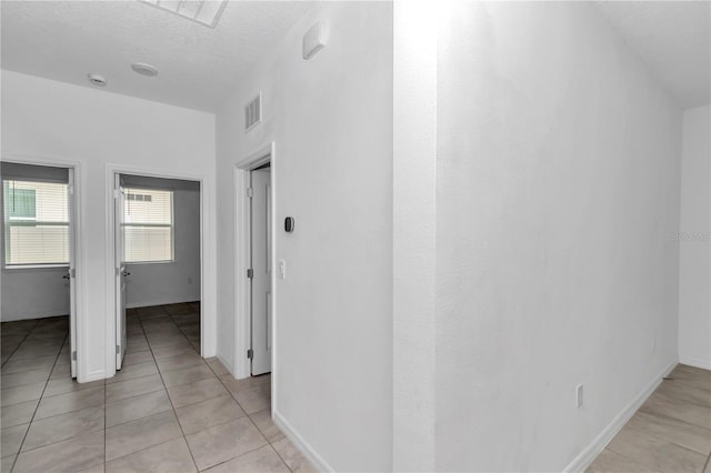 7223 SW 61st Pl, Ocala, FL 34474 - corridor with light tile patterned flooring
